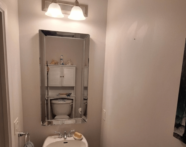 Small bathroom, striped wall Small bathroom, striped wall