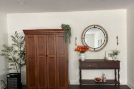 Ok does it look less somber and funeral home-y? Didn’t purchase the mirror yet but everything else is how it’s set up right now- brighter flowers, picture moved, etc