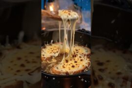 French Onion Soup Over a Campfire 🧅🔥 | Cozy Outdoor Cooking ASMR #shorts #youtubeshorts